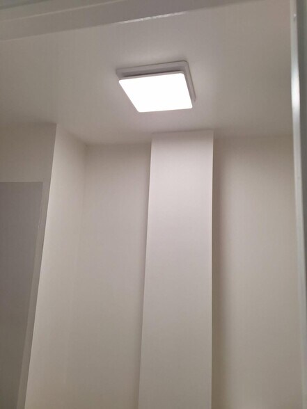 Building Photo - 123-125-125 E 2nd St