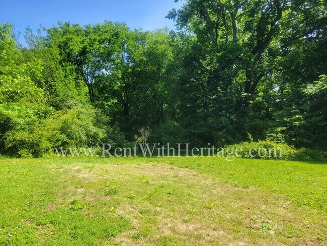 Building Photo - ENJOY THE PRESTIGE OF THIS CHARMING HOME I...