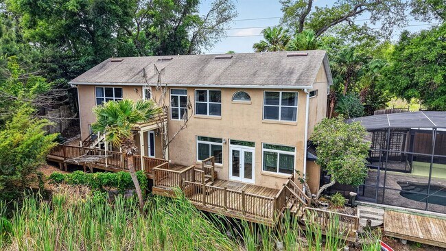 Building Photo - Available Now! Waterfront Living at Its Best – Pool, Decks & Gated Privacy