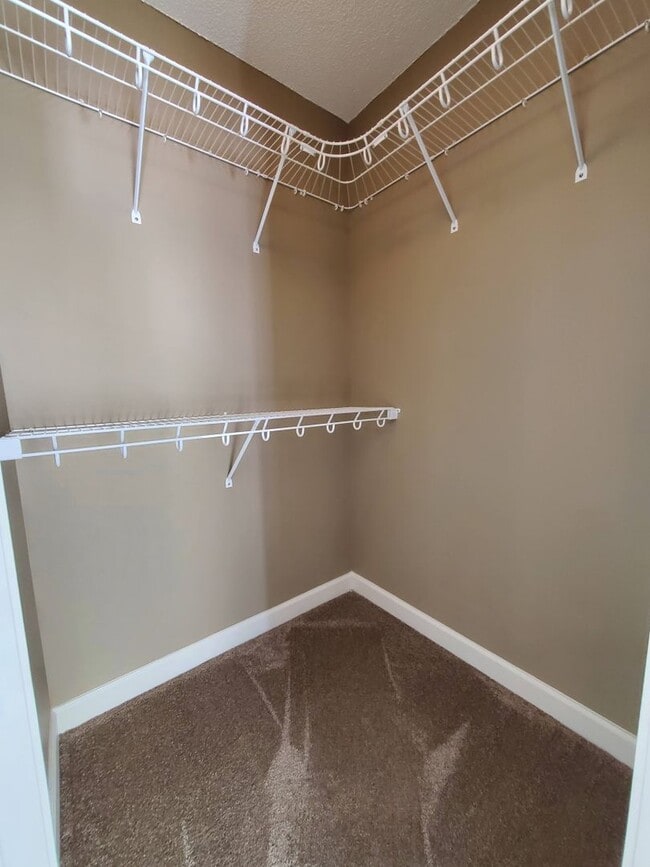 Building Photo - Spacious 4-Bedroom Home with Open Layout, Granite Finishes & Fenced Yard