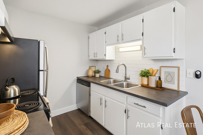 Building Photo - 7155-103 N Raleigh Street-103