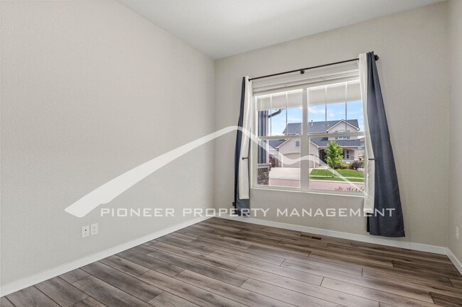 Building Photo - Elegant Ranch-Style Home with Main Floor Primary Bedroom with 3-Car Garage and Finished Basement ...