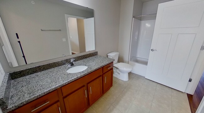Building Photo - Condo Style Upper 2 Bedroom 1 Bathroom Apartment Available