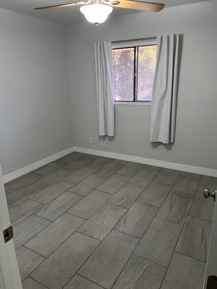 2nd Flr, 2nd Bedroom New Tile & Grout Floor, New Baseboards & Molding, Paint, Curtains - 4444 E Belleview St