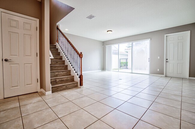 Building Photo - Beautiful 3/3 w/ 2 Car Garage in Gated Vil...