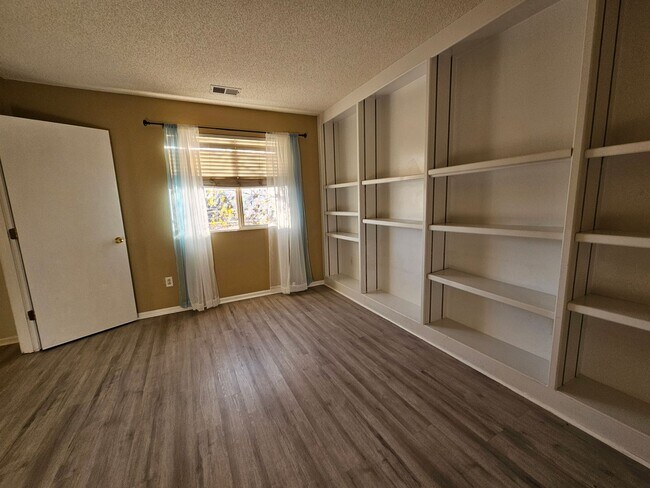 Building Photo - Charming House 3 Beds 2 1/2 Baths 2 Living Areas- Backs To Open Space