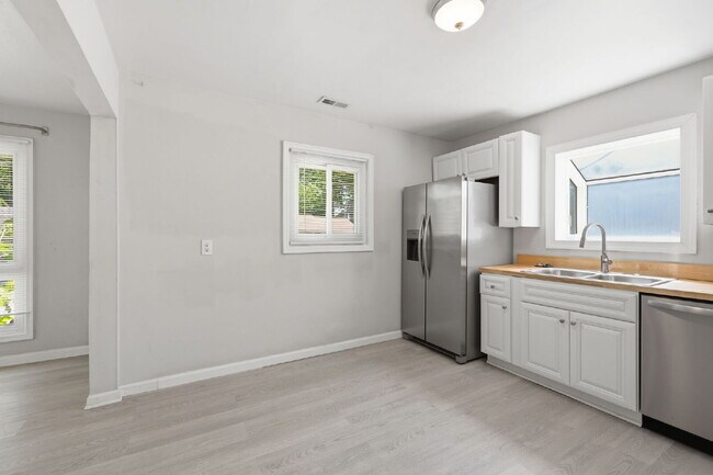 Building Photo - Updated Ranch with Garage, Fenced Yard & One-Level Living