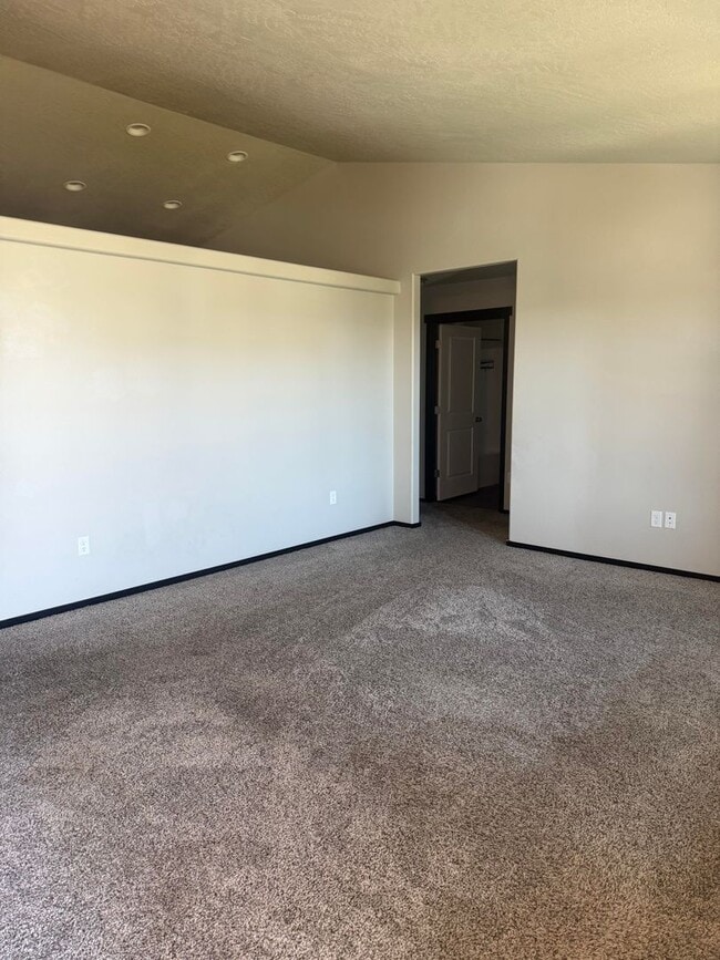 Building Photo - Lots of storage space in this 4- Car garage for all your playthings!!