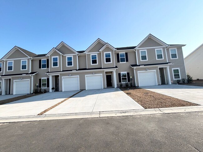 Building Photo - ABSOLUTELY BEAUTIFUL BRAND-NEW BUILD TOWNHOME