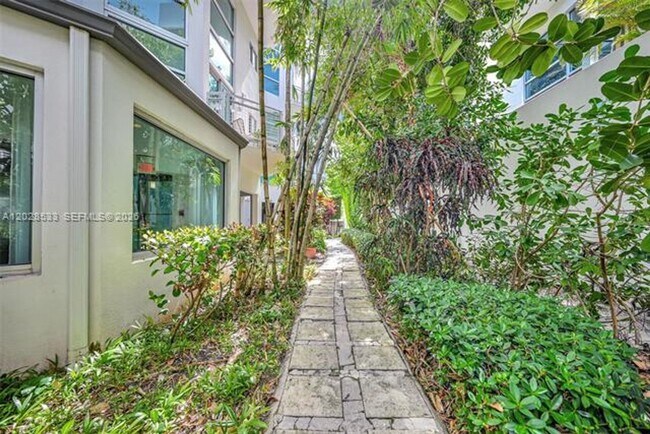 Building Photo - 7728 Collins Ave