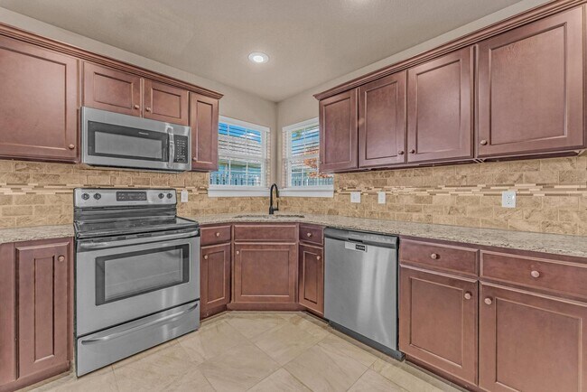 Building Photo - Beautiful 3-Bedroom Home with Open Layout & Fenced Backyard!