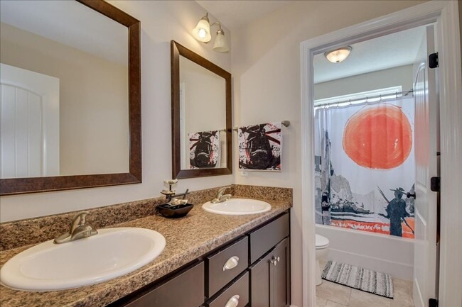 Building Photo - 4 bed, 2.5 bath home on corner lot with 2 car garage and fenced in back yard