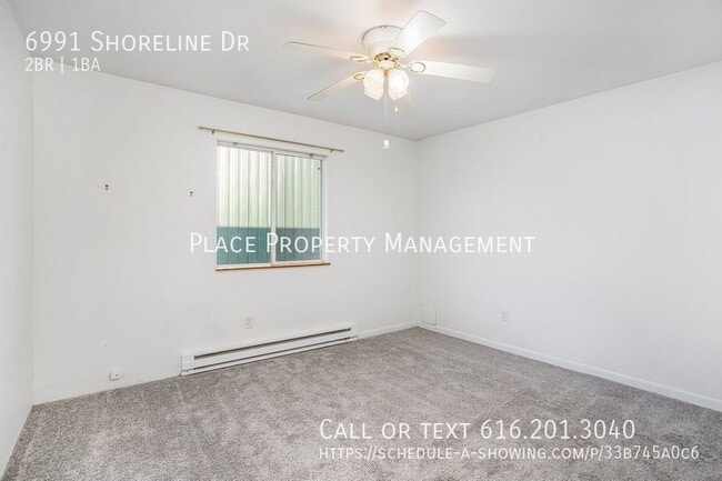 Building Photo - 6991 Shoreline Dr