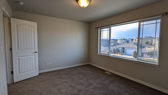 Building Photo - FOUR BED/3 BATH PRAIRIE STYLE HOME WITH GOURMET KITCHEN IN CORDERA NEIGHBORHOOD!