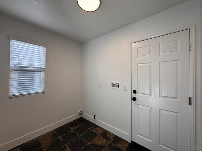 Building Photo - Stylish Renovated Home with Garage & Priva...