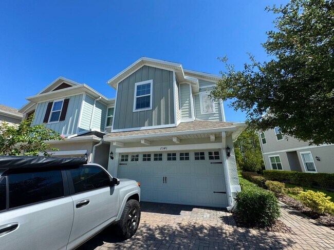 Building Photo - Beautiful End Unit Townhome Near Lake Nona w/ 2-Car Garage & Conservation Views!