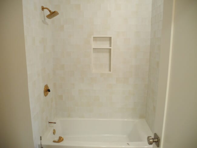 Newly tiled bathub/shower - 1934 Henderson Ave