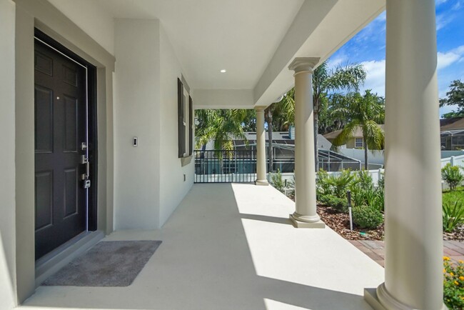 Building Photo - Stunning 4/3 in Gated Dora Parc! Water Views!