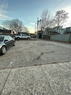 large lot behind building for off street parking - 1515 Holman Ave