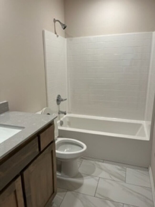 Building Photo - BRAND NEW HOME! First month free!