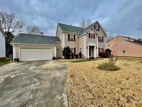 Building Photo - Welcome to this beautiful 4-bedroom, 2.5 bathroom home located in the vibrant city of Charlotte, NC