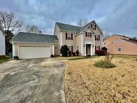 Building Photo - Welcome to this beautiful 4-bedroom, 2.5 bathroom home located in the vibrant city of Charlotte, NC