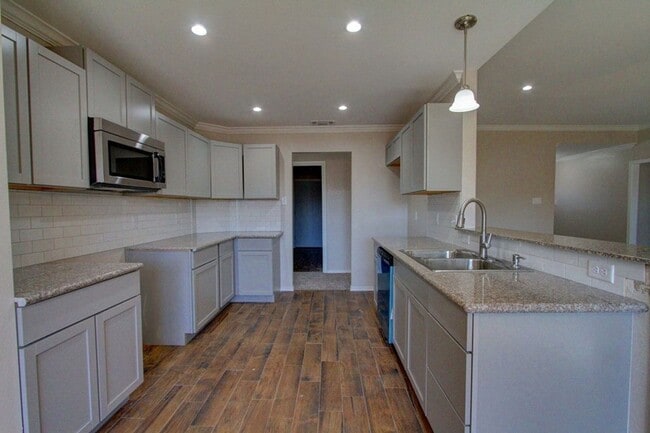 Building Photo - COMING SOON - 4 Bedroom Home + 2 Car Garage and Privacy Fenced Backyard!