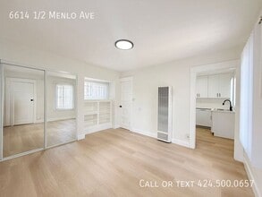 Building Photo - 6614 1/2 Menlo Ave-