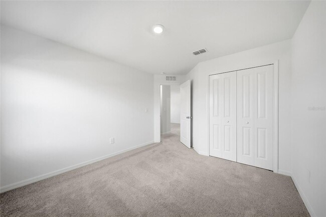 Building Photo - 8879 Coqui Song Ln