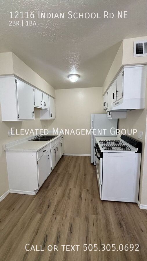 Building Photo - 12116 Indian School Rd NE