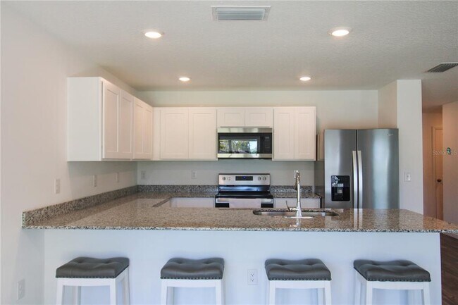 Building Photo - 10276 N Spaulding Dr