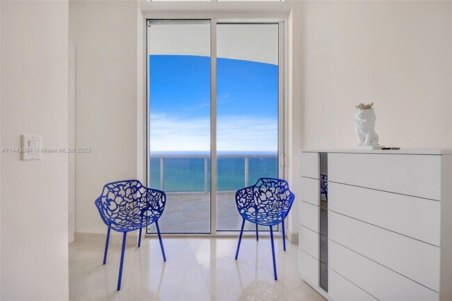 Building Photo - 15811 Collins Ave