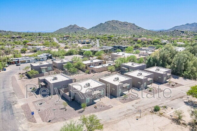 Building Photo - 6050 E Hidden Valley Dr