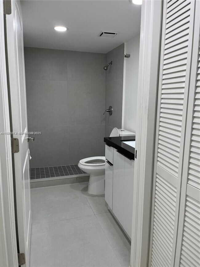 Building Photo - 9917 W Okeechobee Rd