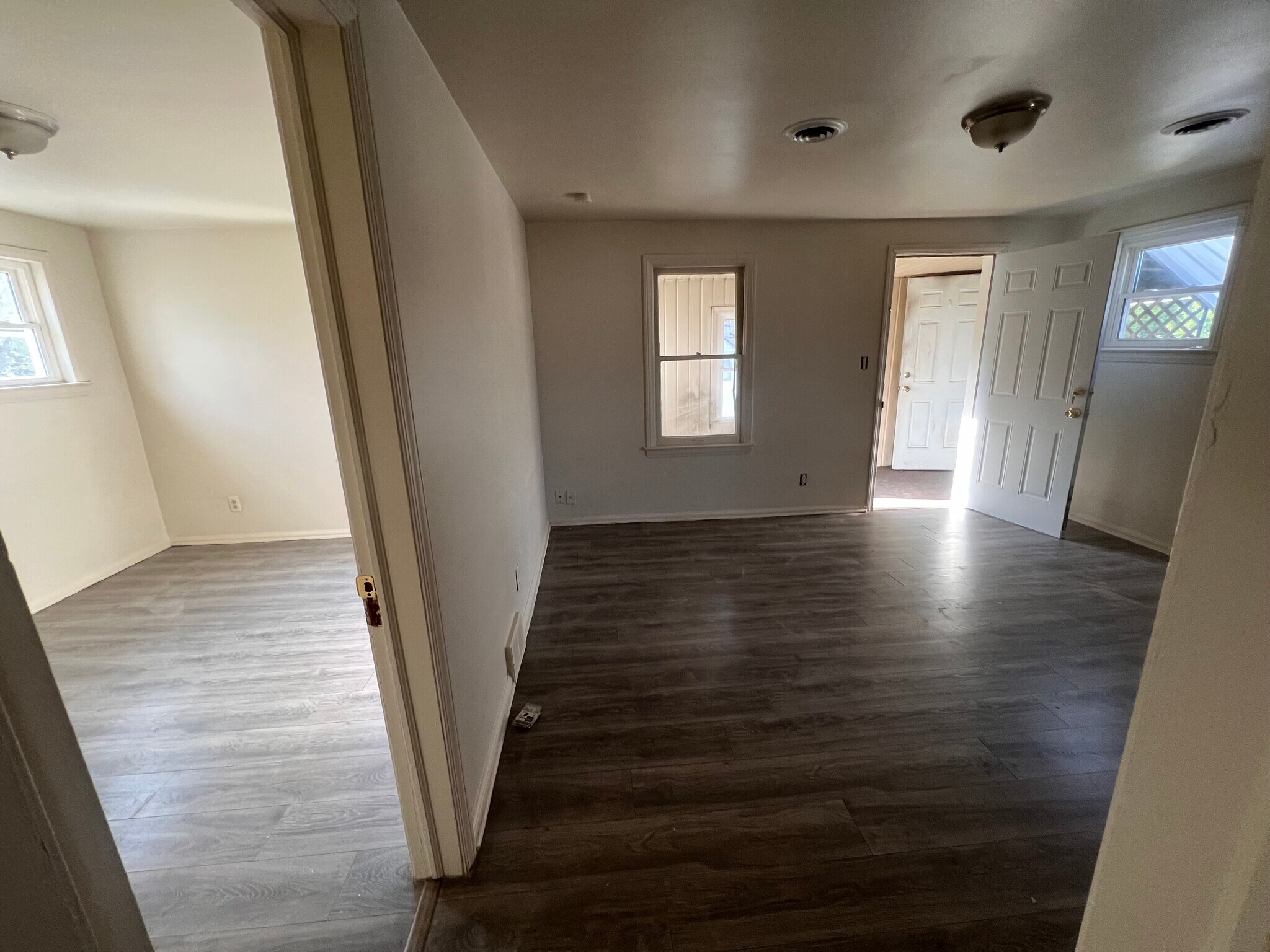 Unit-2: Bedroom (left) and Living Room (right) - 7543 Paige Ave