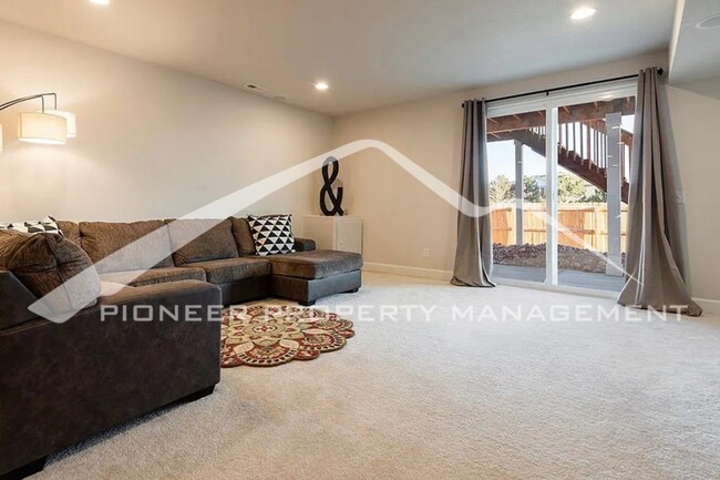 Building Photo - Stylish Main-Level Living with Finished Ba...