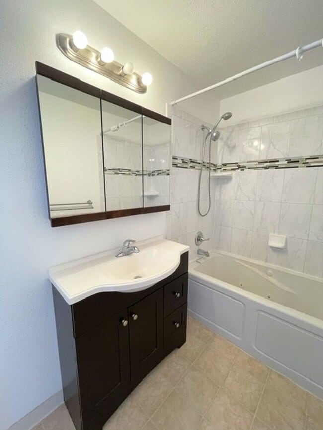 Building Photo - RARE FIND! Spacious and bright three bedro...