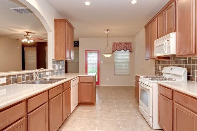 Building Photo - 14547 Gleaming Rose Dr