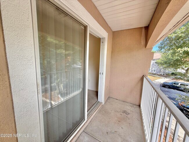 Building Photo - 6788 Manotak Oaks Dr
