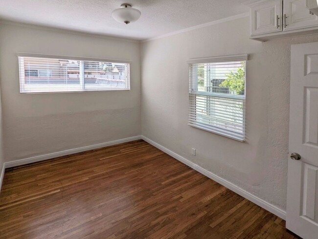 Second Bedroom with extra cabinets above closet - 1830 S Curson Ave