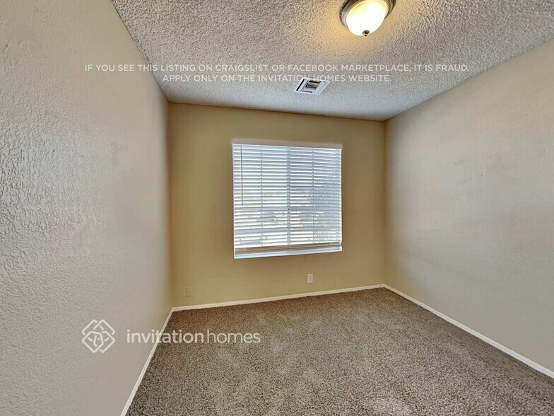 Building Photo - 8445 W Emile Zola Ave