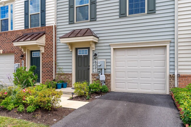 Building Photo - Townhouse with 1-Car Garage, Rooftop Deck ...