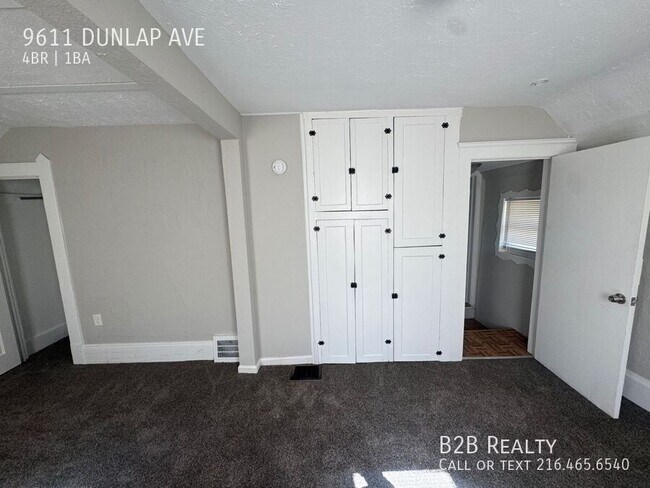 Building Photo - 9611 Dunlap Ave