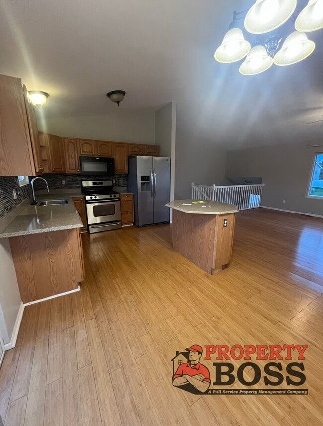 Building Photo - 3023 W 63rd Ln