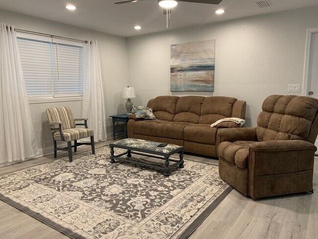 Spacious family area with 75'' HDTV, Soundbar, - 1301 E Leonard St