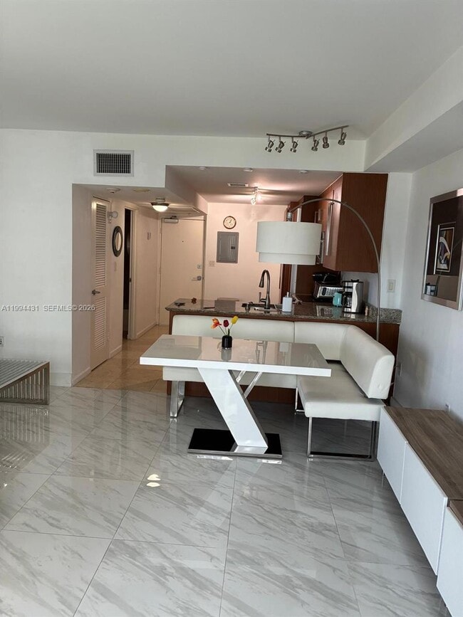 Building Photo - 10275 Collins Ave