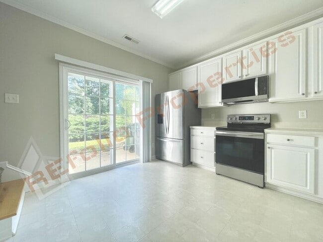 Building Photo - Fresh Paint Interior! Lovely 3 Bedroom 2.5...