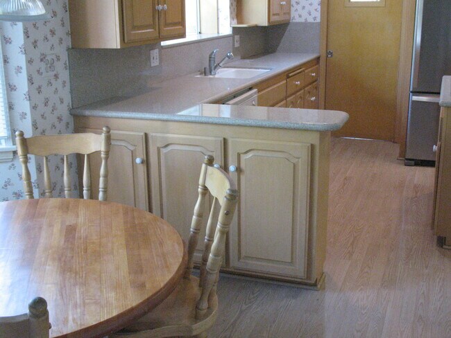 Sliding door into another huge bedroom with hardwood floors - 3121 W Wyoming Ave