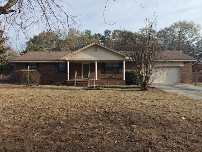 Building Photo - Elegant & Spacious 3-Bedroom Brick Home with Private Garage