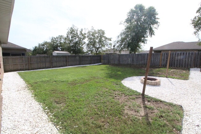 Building Photo - Beautiful 3BR/2BA Brick Home with Granite Kitchen, Covered Patio, Fire Pit & 2-Car Garage Near I-10